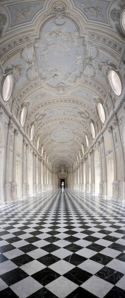 Venaria (Turin), Italy - 05 23 2015: vertical panorama of the Baroque Galleria Grande (also known as Diana's Gallery) inside the Royal Palace of Venaria