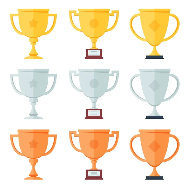 Gold, silver, bronze trophy in flat icons set. — Stock Vector