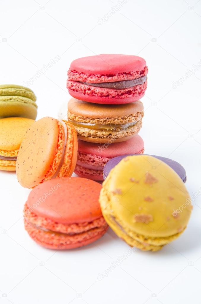 Colorful macaroons on white background