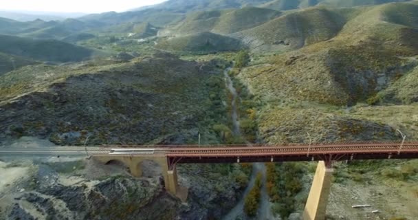 4K Aerial, Flight over a railroad bridge and surroundings, Andalusia, Spain — Stock Video