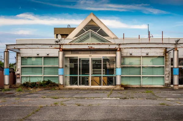 Abandoned and derelict roadside shop building, Kanazawa Japan.