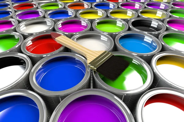 Multiple open paint cans with a brush. — Stock Photo, Image
