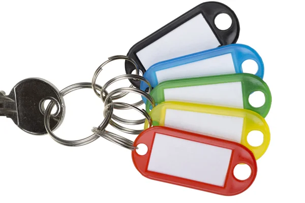 Uma chave com cinco tags — Fotografia de Stock