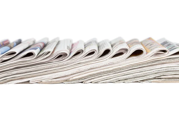 Assortment of folded newspapers — Stock Photo, Image