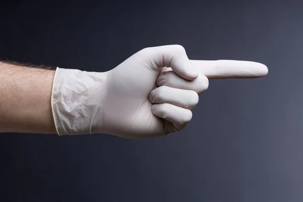 Male hand in latex glove — Stock Photo, Image