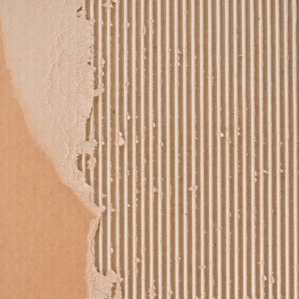 Torn corrugated cardboard. — Stock Photo, Image