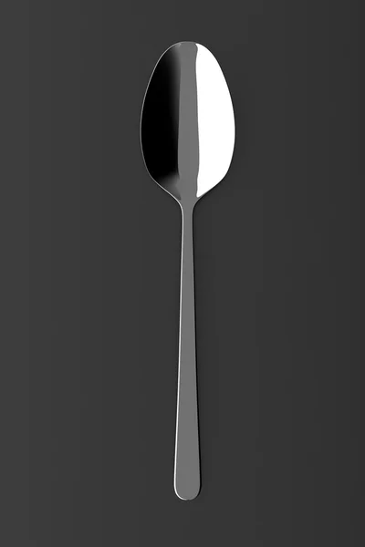 Silver spoon on a table — Stock Photo, Image