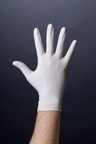 Male palm in latex glove — Stock Photo, Image