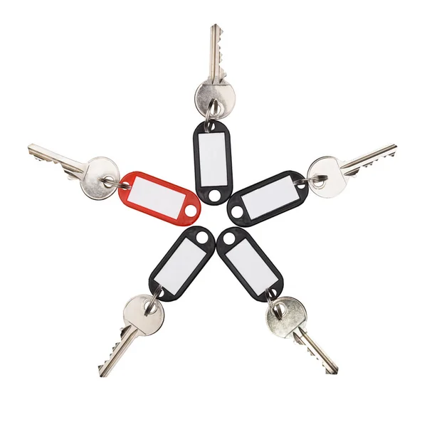 Keys with red and black tags in a form of star — Stock Photo, Image