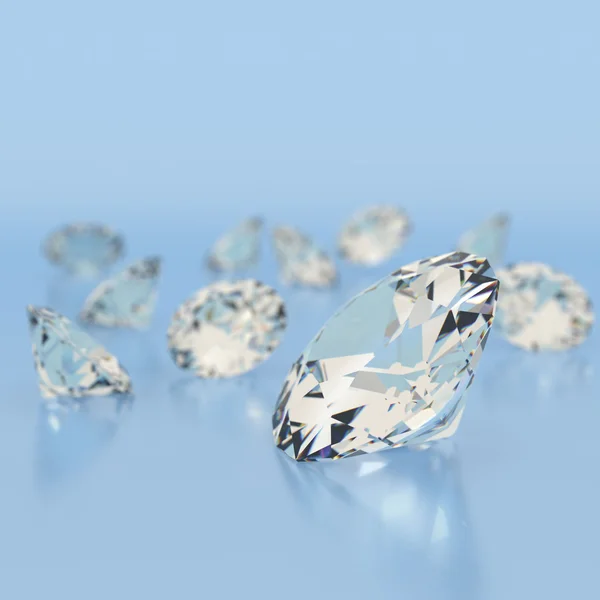 Glänzend weisse Diamanten auf blauem Hintergrund. — Stockfoto