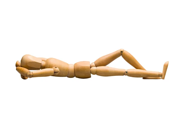 Wooden mannequin lying down — Stock Photo, Image