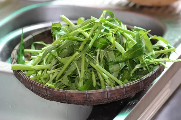 Water spinach swamp cabbage kangkong in the basket — Stock Photo, Image
