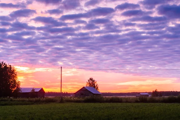 Blå og rød solnedgang – stockfoto