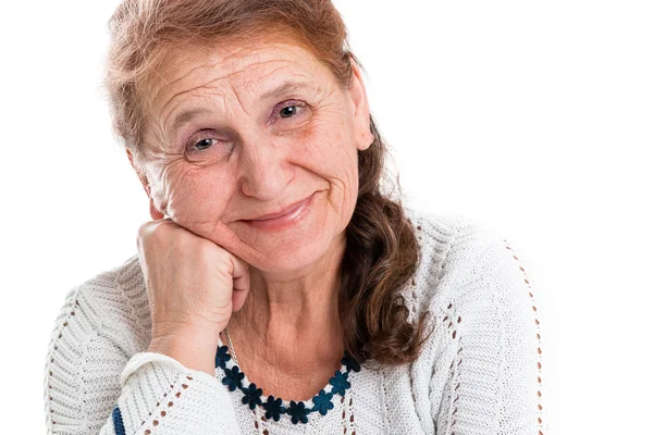 Retrato de uma velha mulher feliz em um fundo branco — Fotografia de Stock