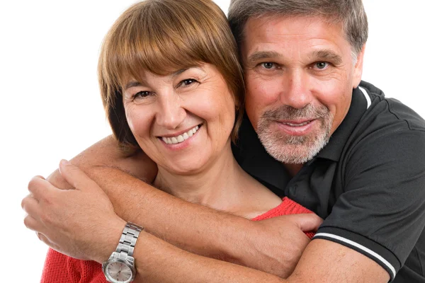 Hombre y mujer. Retrato de una hermosa pareja adulta feliz sobre un fondo blanco — Foto de Stock