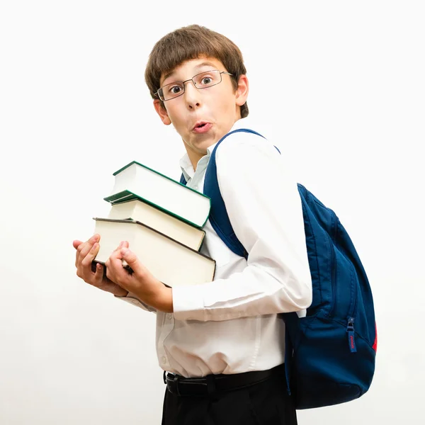 Portrait d'un adolescent drôle avec des livres — Photo