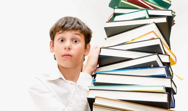 Porträt eines Jungen mit Büchern. — Stockfoto