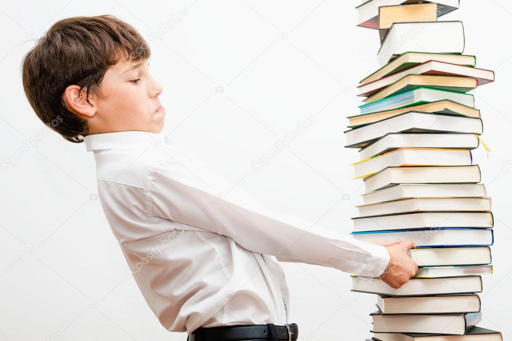 Portrait of a boy with books