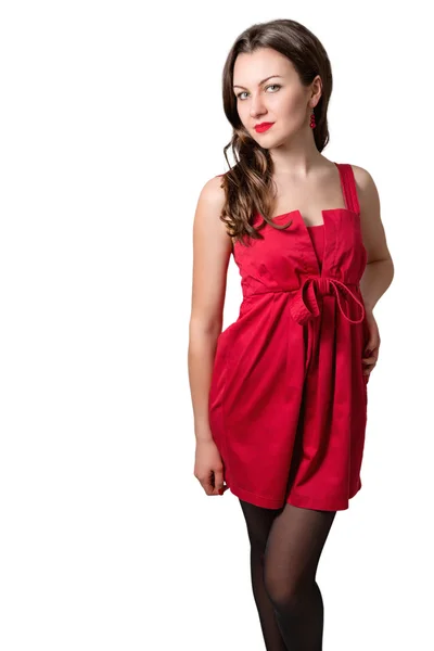 Πορτρέτο του μια όμορφη νεαρή σέξι γυναίκα εν ολίγοις κόκκινο φόρεμα. — Φωτογραφία Αρχείου