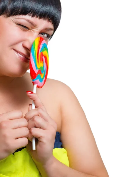 Portrait of a beautiful thick woman with a candy — Stock Photo, Image