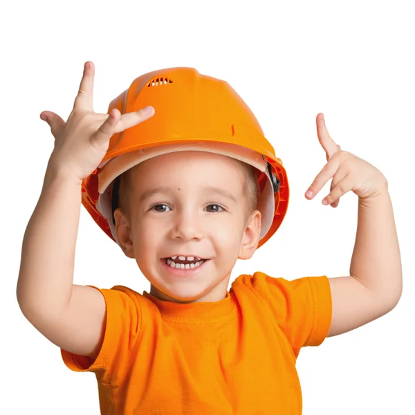 Child in the construction helmet on a white background. — Stock Photo, Image