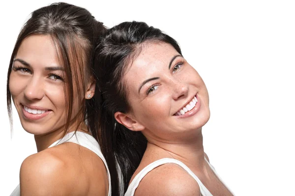 Portrait of two beautiful happy young woman — Stok fotoğraf