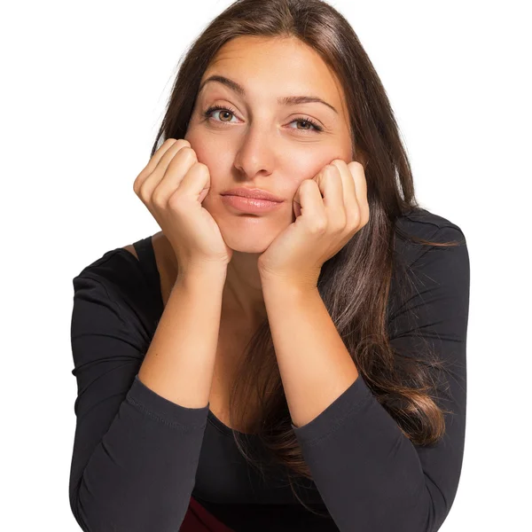 Portrait of beautiful sad woman on a white background — Stockfoto