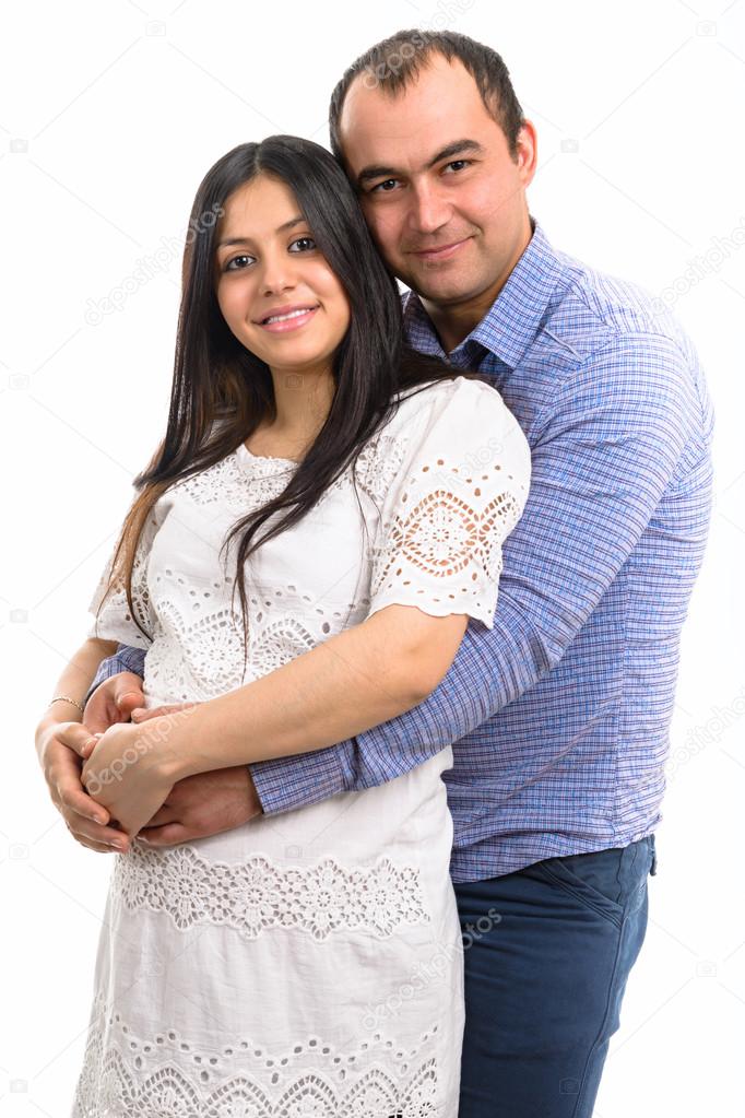 Family. Man and woman. Portrait of a beautiful married couple expecting baby