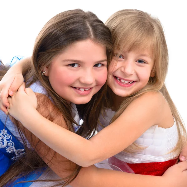 Portrait of two cheerful little girl on a white background — Stock Photo, Image