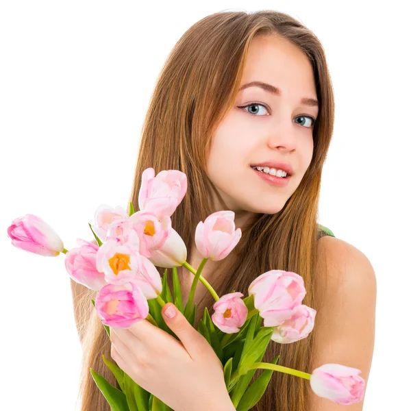 Portret van een mooie jonge vrouw met bloemen op een witte achtergrond — Stockfoto