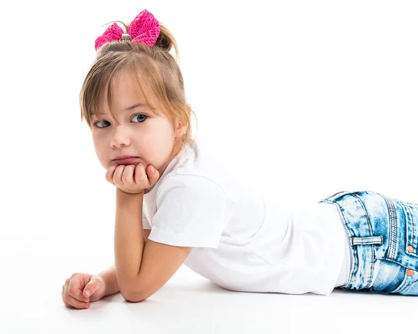 Portrait of a pretty little girl on a white background — Stock Photo, Image