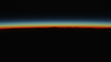 Dünya 'nın üzerinde yükselen güneş