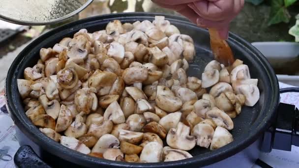 Cooking mushrooms slow motion — Stock Video