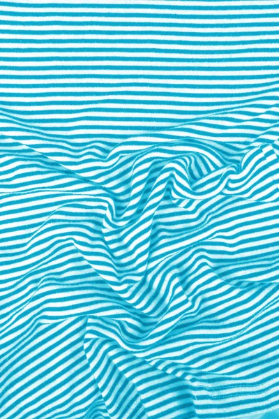 Striped wrinkled turquoise and white zebra fabric cloth background — Stock Photo, Image