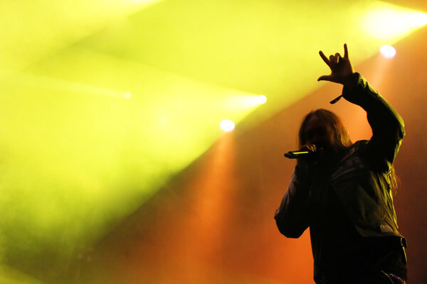 Male singer silhouette heavy metal concert