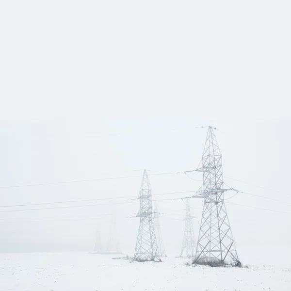 Linie energetyczne w mglisty pola Zdjęcia Stockowe bez tantiem