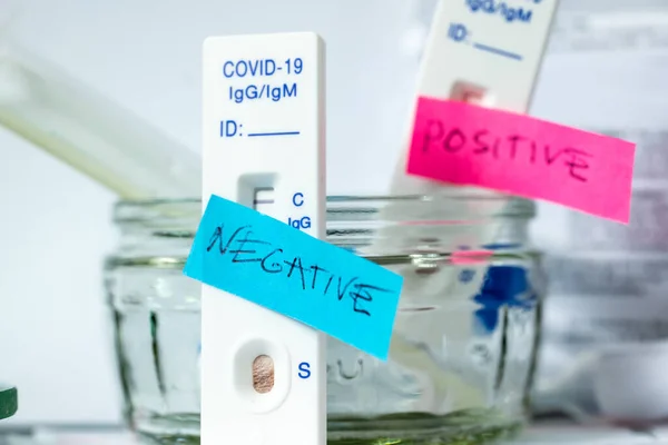 Two Covid Tests One Marked Positive Another One Negative — Stock Photo, Image