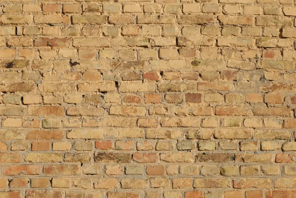 Oude geschilderde baksteen muur close-up. — Stockfoto