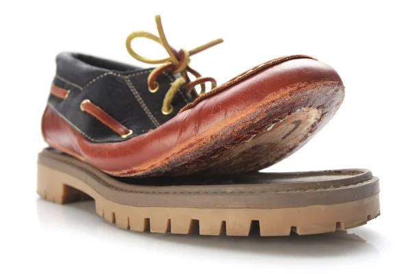 Torn shoe on a white background isolate. — Stock Photo, Image