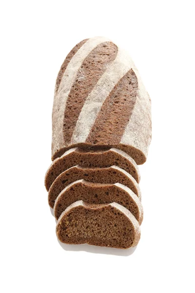 Loaf and slices of rye bread on a white background — Stock Photo, Image