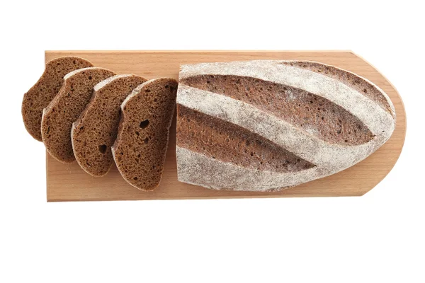 Loaf and slices of rye bread on a cutting boards isolate — Stock Photo, Image