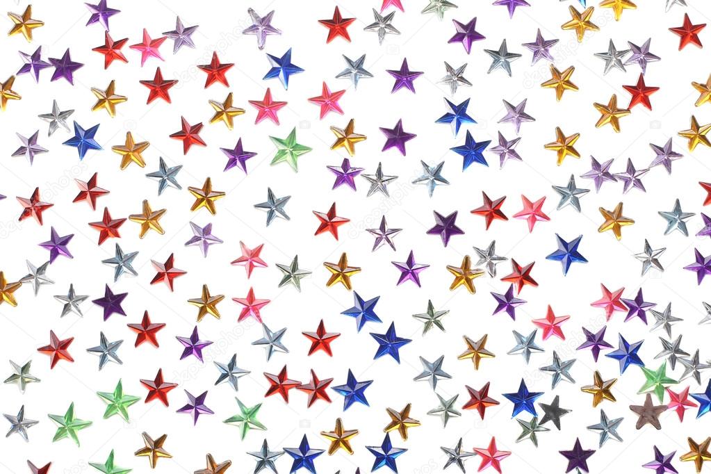 colored stars confetti on white background 