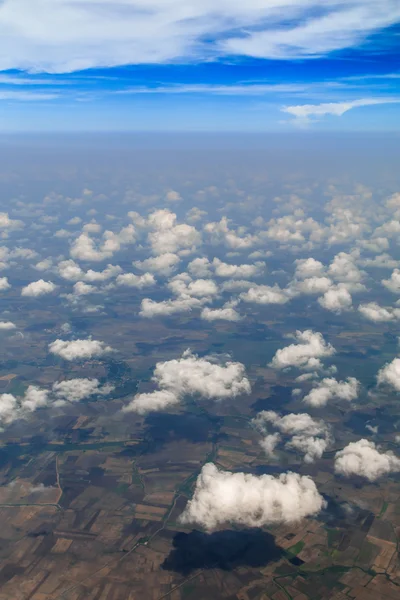 Aerial view of clouds and village — Stock Photo, Image