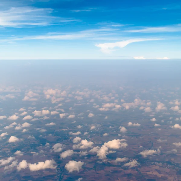 Aerial view of clouds and village — Stock Photo, Image