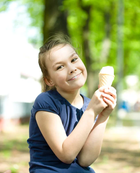 Girl is eating ice-cream — Stock Photo, Image