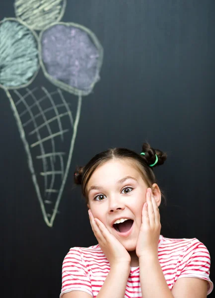 Girl is eating ice-cream — Stock Photo, Image