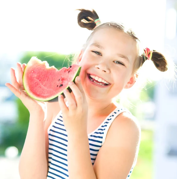 Girl is eating watermelon — Stock Photo, Image