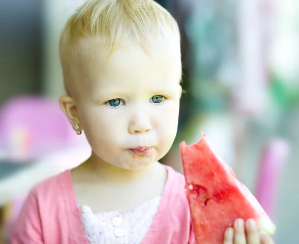 Girl is eating watermelon — Stock Photo, Image