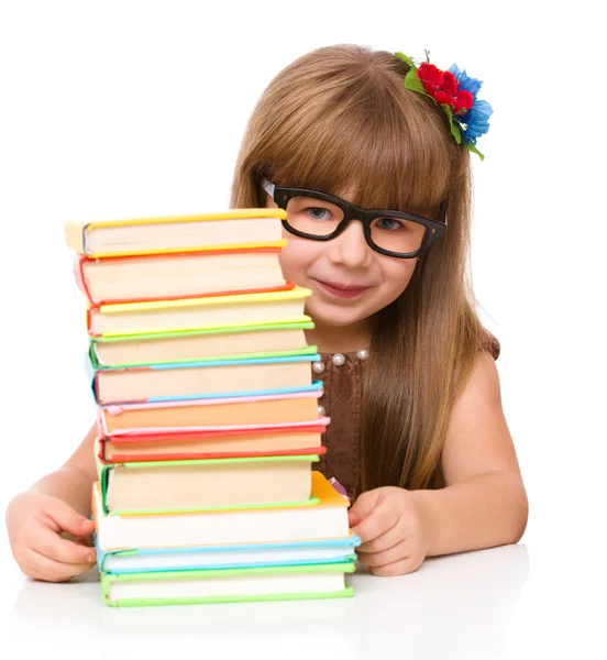 Cute girl is reading book — Stock Photo, Image