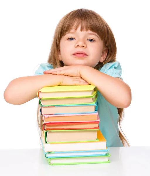 Cute girl is reading book — Stock Photo, Image